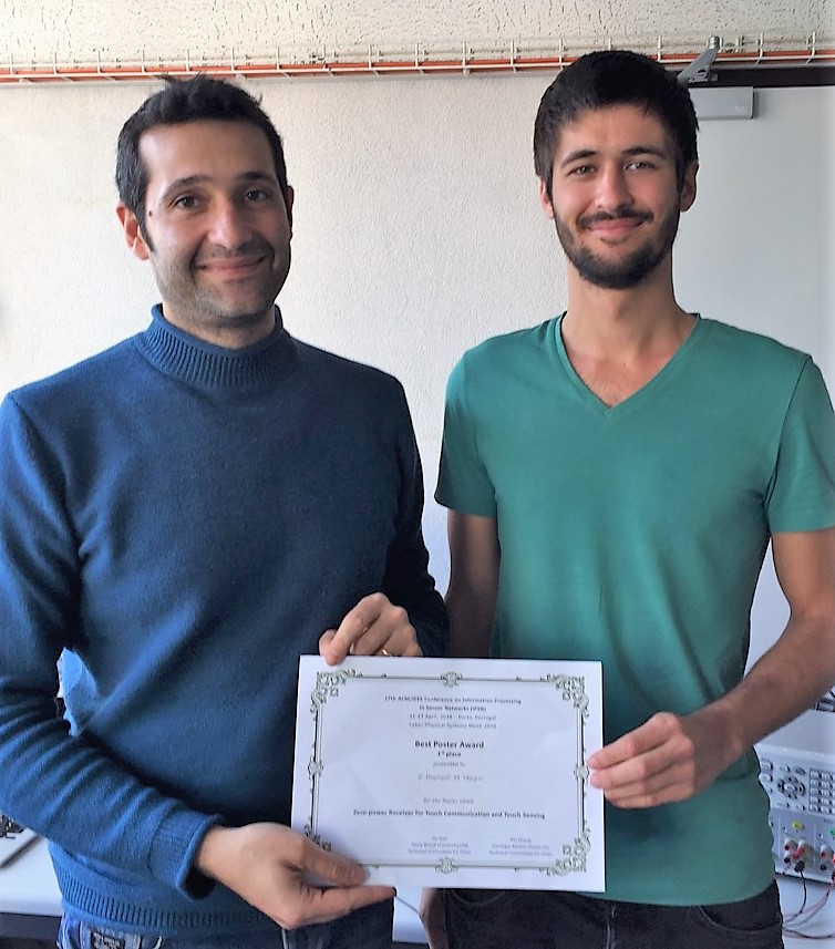 Picture of Michele Magno and Rafael Strebel receiving best poster award at IPSN